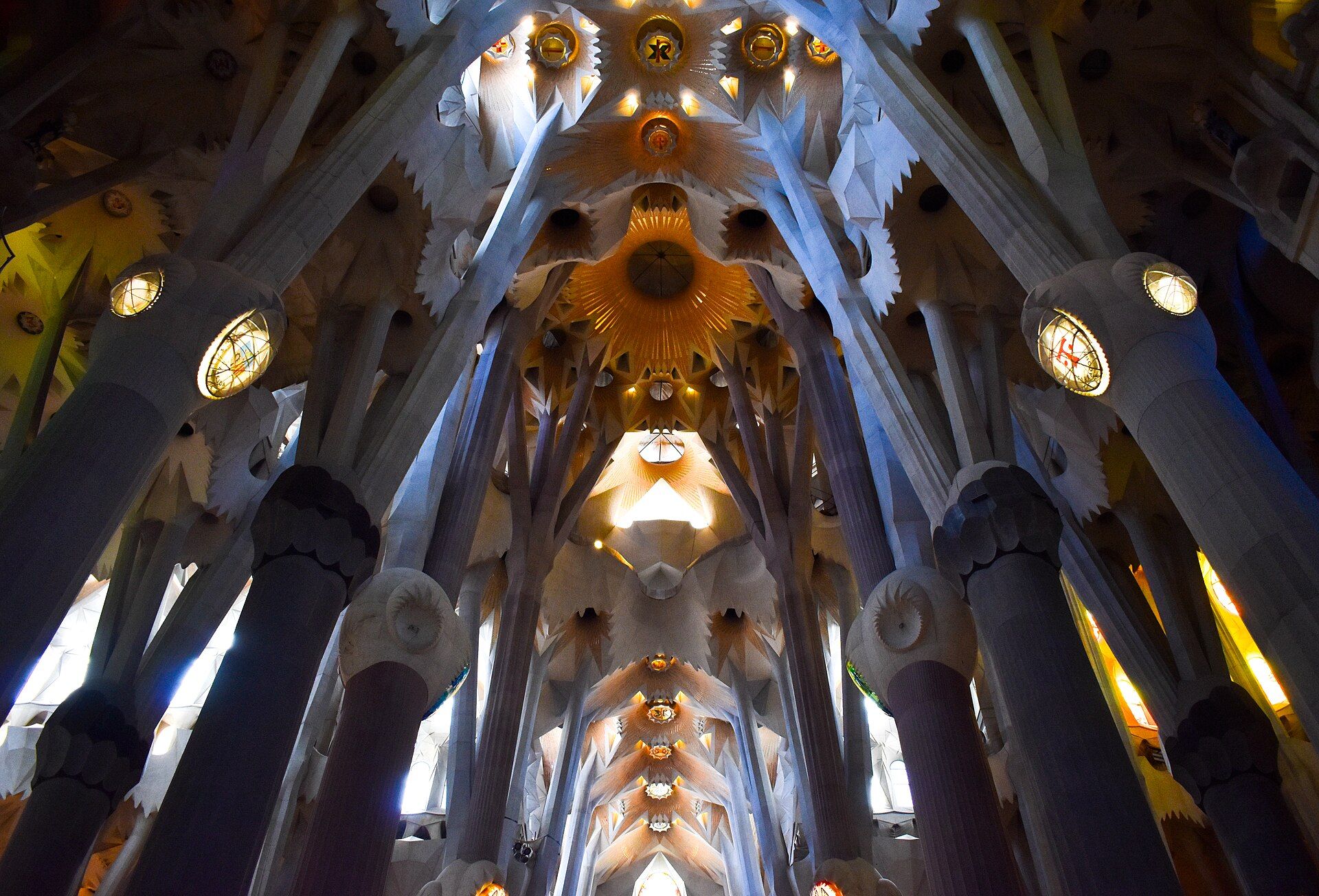 The forest-like columns and stained-glass light inside the Sagrada Familia nave